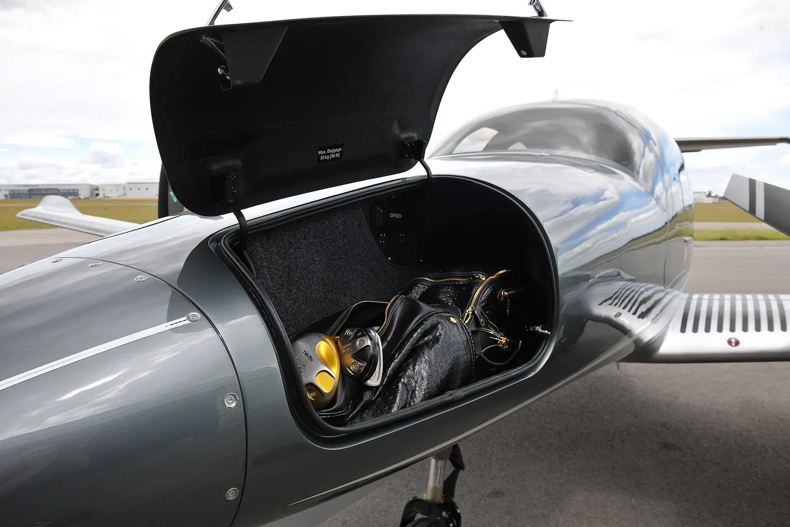 Diamond DA62 nose baggage compartment open, showing additional storage capacity for travel convenience.