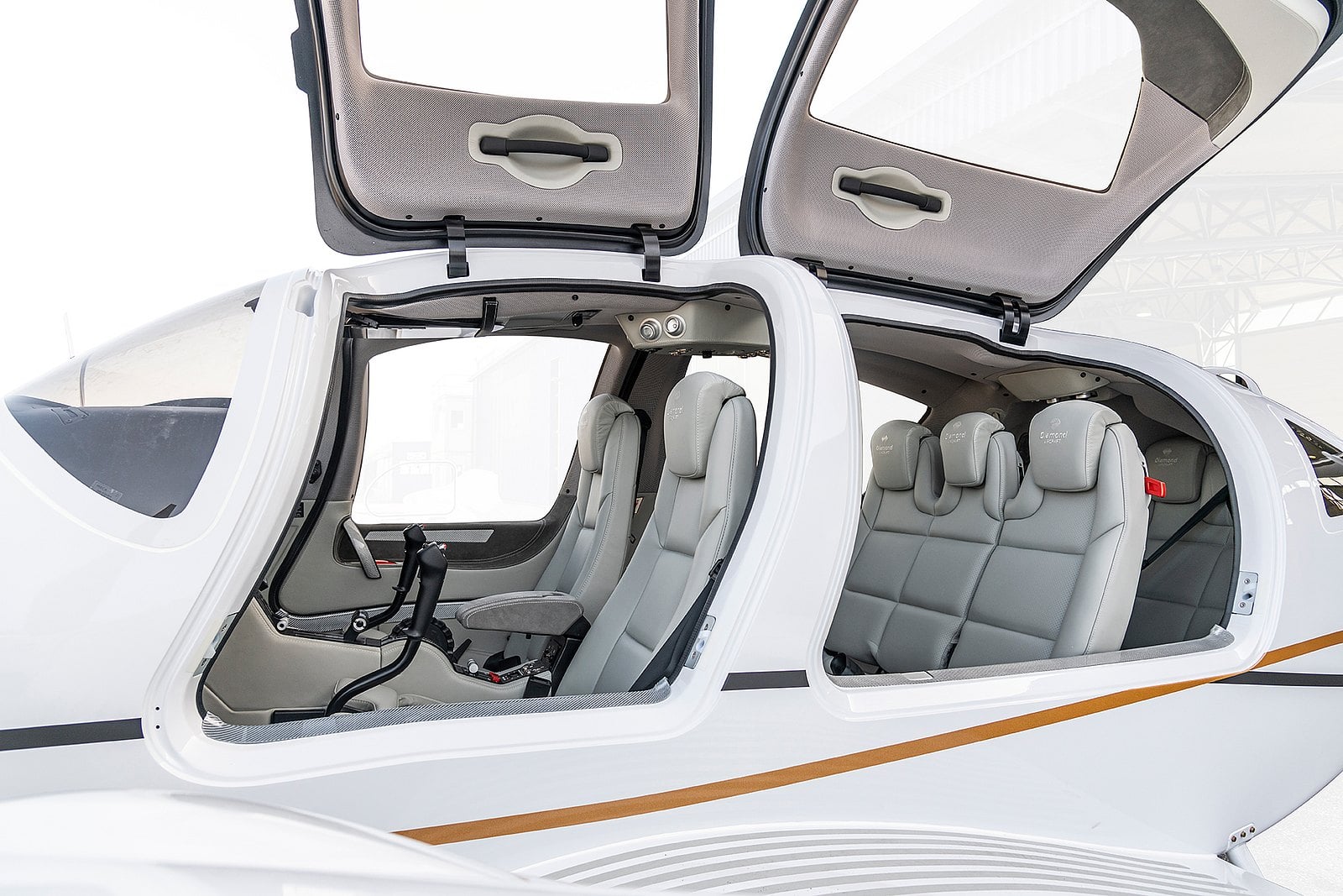 Diamond DA62 premium passenger cabin with leather seating and wide-opening doors for easy access.