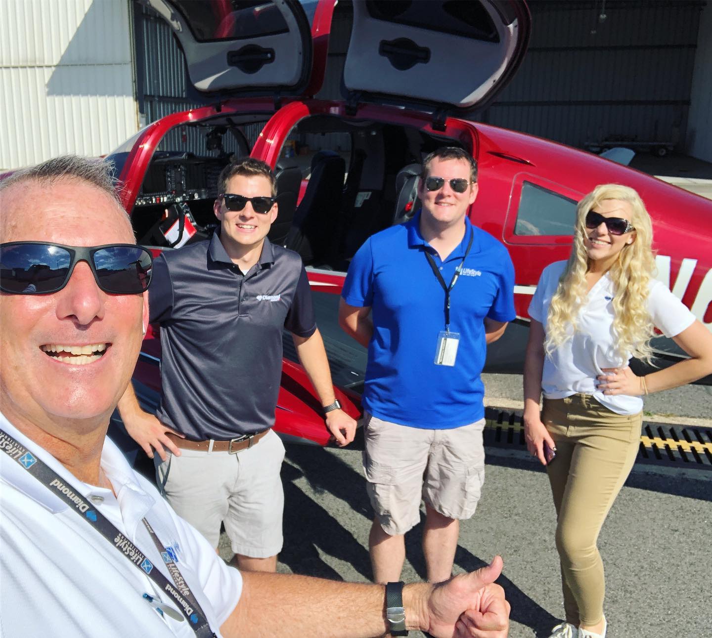 LifeStyle Aviation Team in front of red DA62