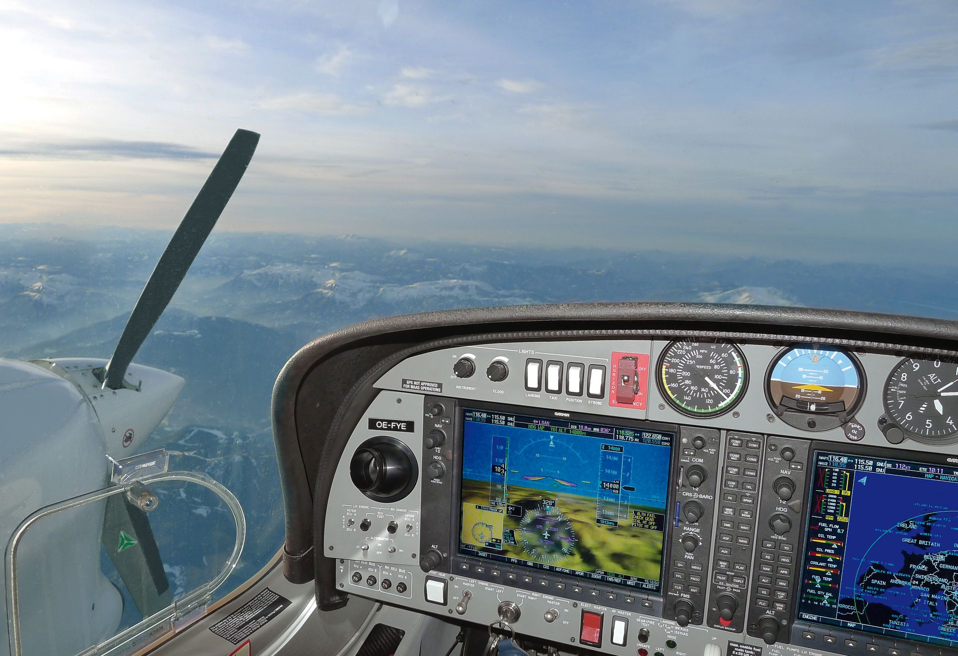 Looking out the window of a DA42 flying