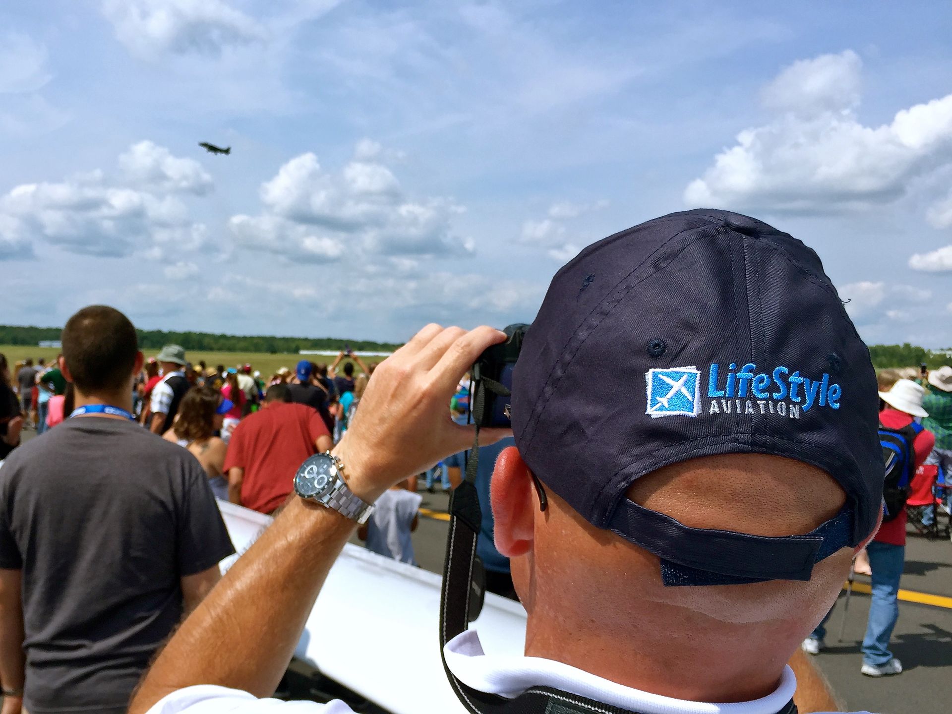 Watching airplane take off at air show