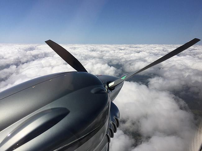 DA62 propeller above clouds