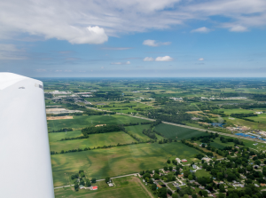 DA40 flying over Indiana Farmland