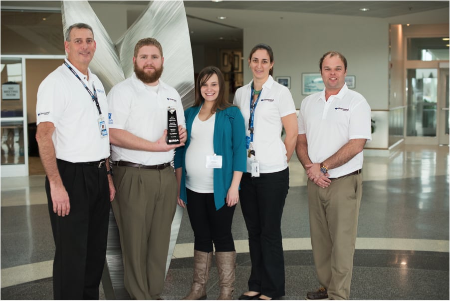 Blue Line Aviation LLC receiving Outstanding Achievement Award